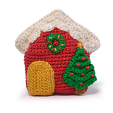 Circulo Amigurumi Sparkle 149 m / 80 g - Crocheted Christmas house amigurumi made with Circulo Amigurumi Sparkle yarn, featuring a red house, white glitter roof, green Christmas tree and festive holiday details.