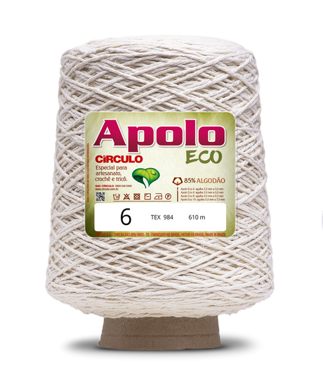 Apolo Eco 4/6 Cotton Cord Yarn – Ideal for Crochet Bags & Home Decor (600g) - Leo Hobby - A large cone of off-white textured yarn with a green and gold Apolo Circulo Eco label, standing on a brown cardboard base against a white background.